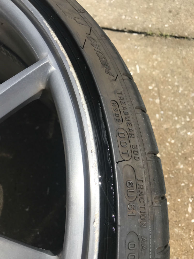 Close up of curb rash.